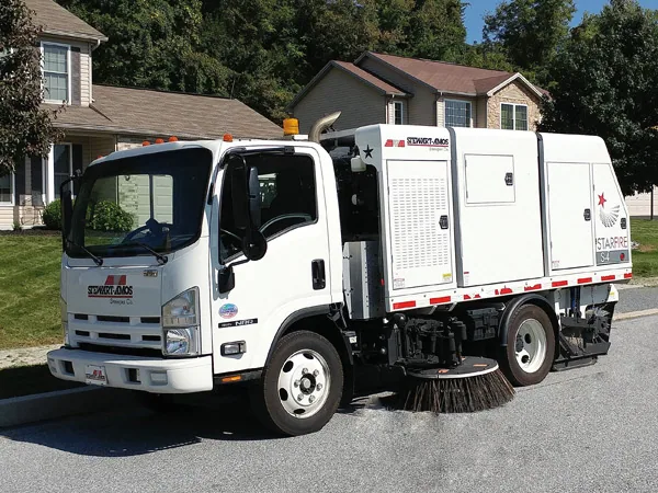 Starfire S-4c sweeping residential street